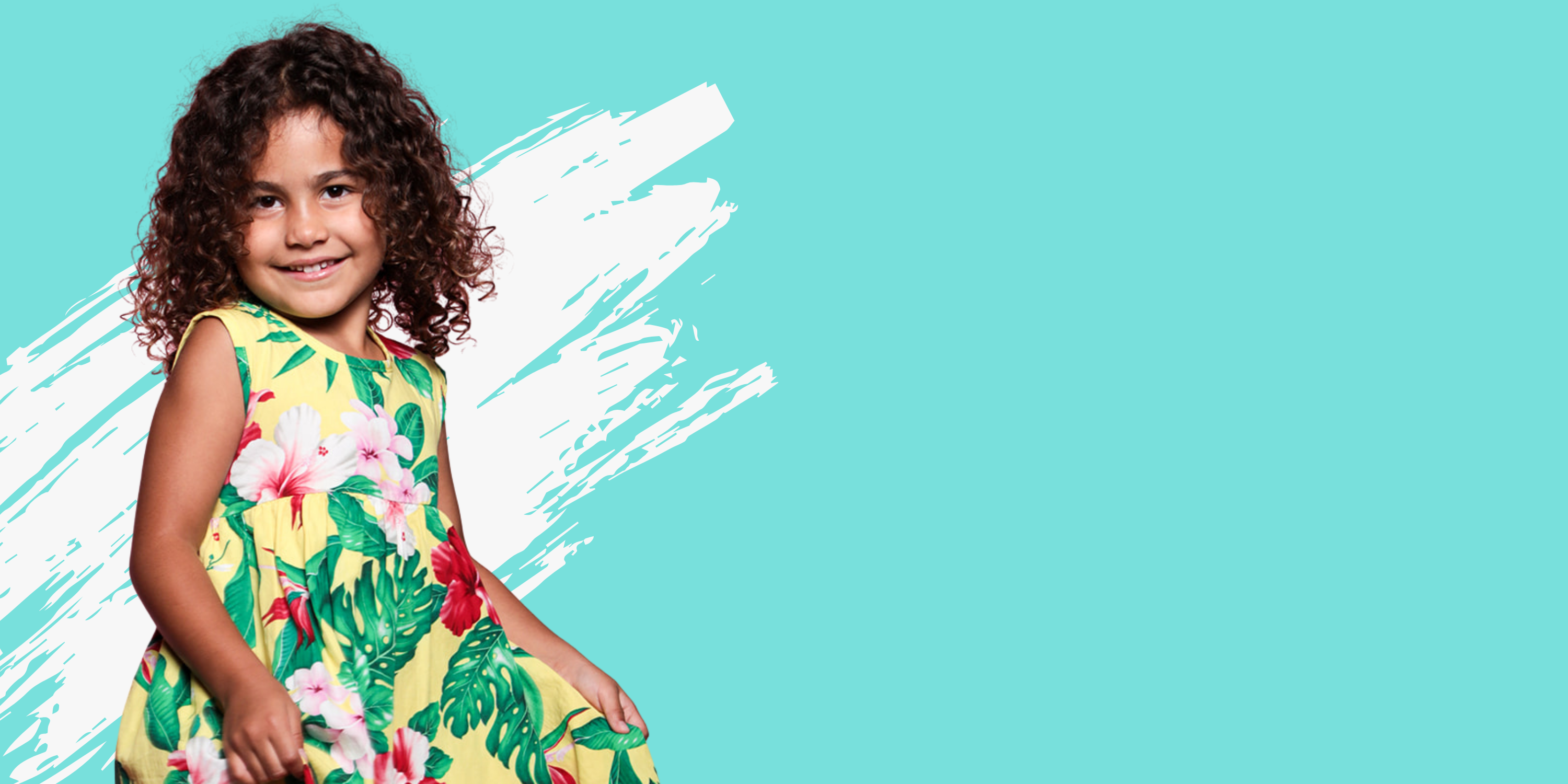Child wearing a floral dress on a turquoise background