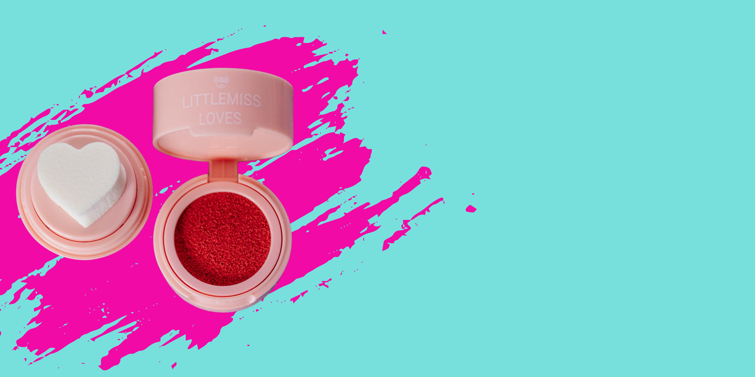 Makeup compact with heart-shaped lid on a colorful background