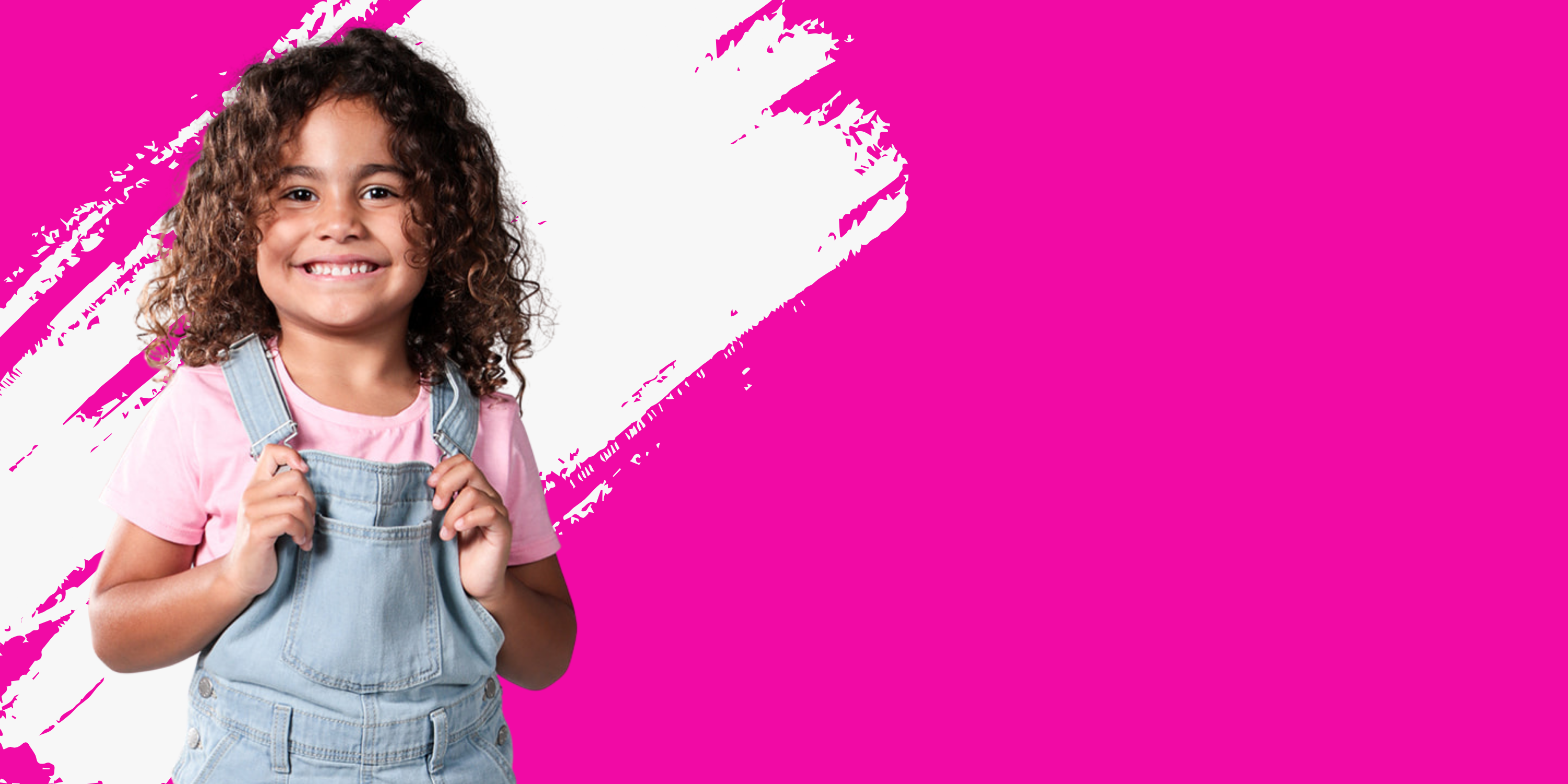 Child wearing a pink shirt and denim overalls against a pink background with white paint strokes
